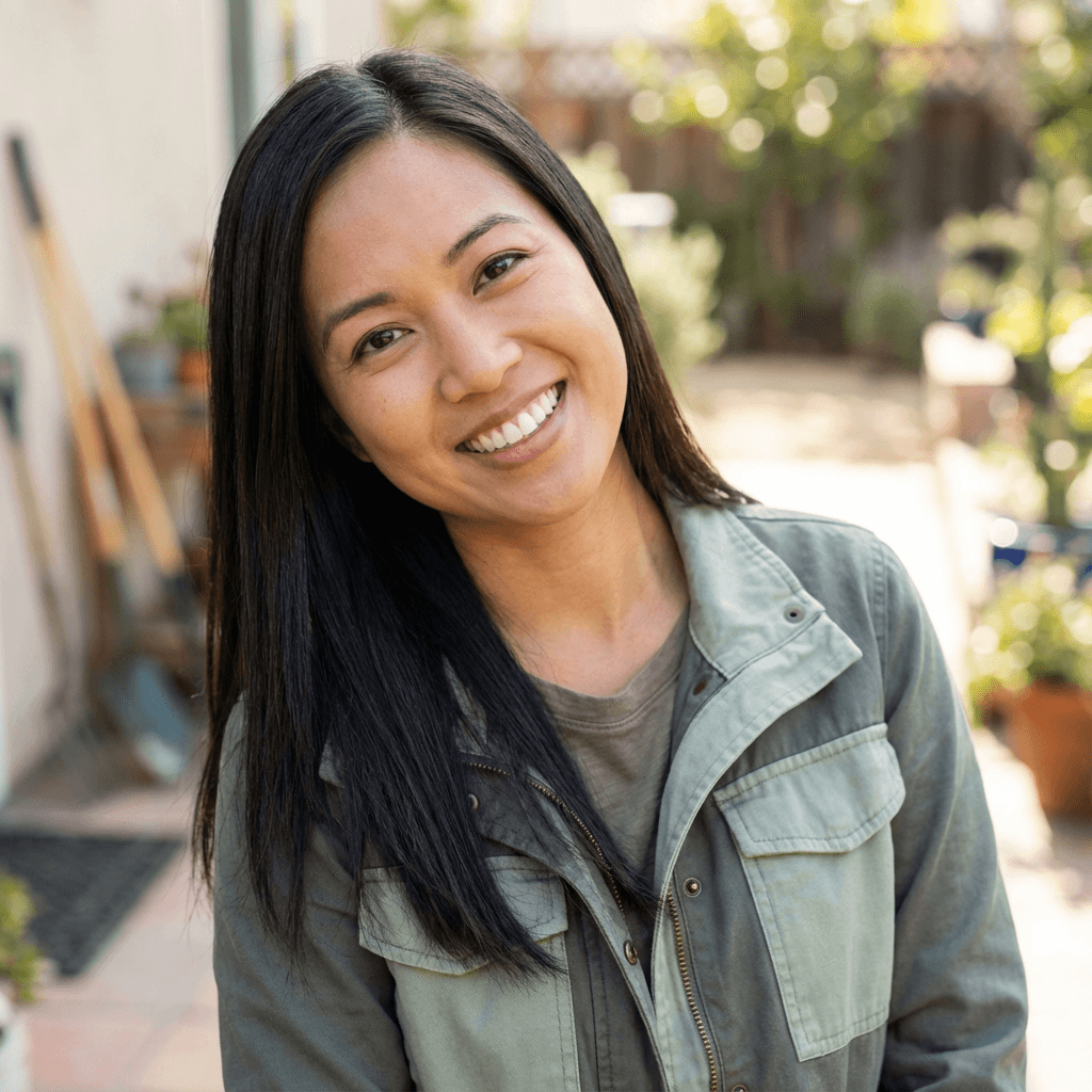 Female renter in her early 30s, Hispanic, warm smile